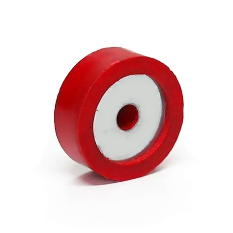PAC W20R Sound Isolation Washer — red rubber outer body with a steel core showing the central fastener hole.