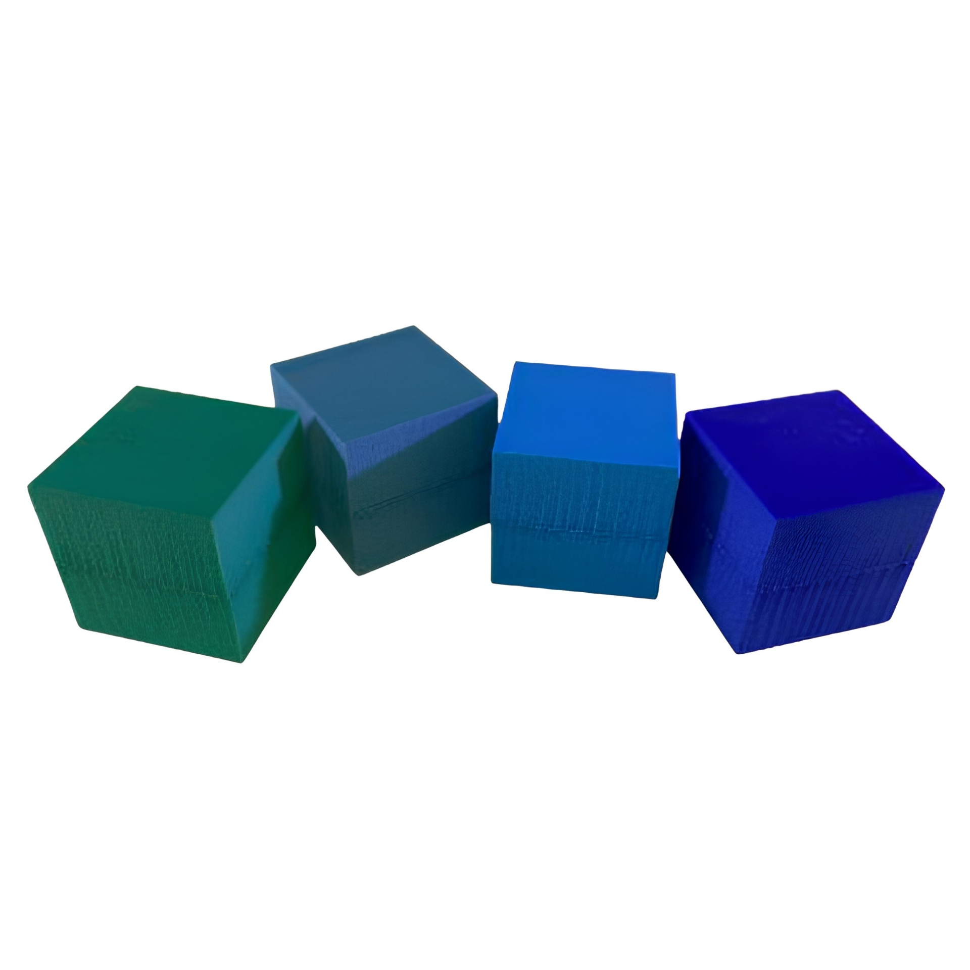 PAC International IFB2 floor isolator blocks — four color-coded 2" high-density rubber cubes representing the density options that decouple floating floor assemblies